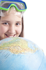 school age girl with globe foreground
