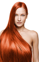 woman with long healthy shiny red hair
