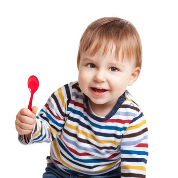 Baby Holding Spoon