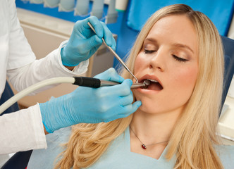 woman patient in dentist chair