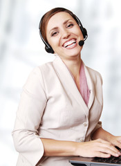 Happy smiling call center operator