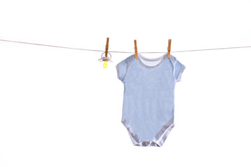Colorful baby goods hanging on the clothesline