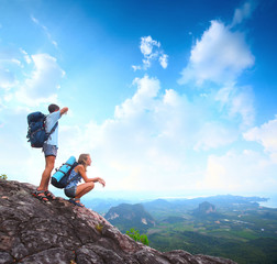 Backpacker on a rock