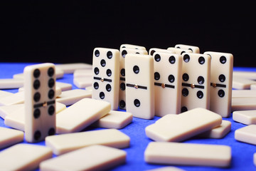 group of figures domino on blue background
