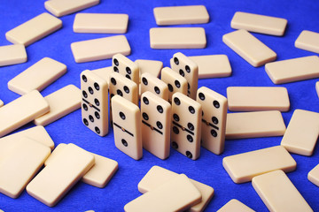 group of figures domino on blue background