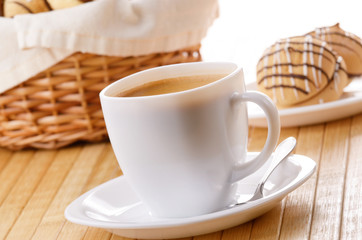 Coffee with cookie sandwich