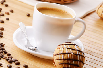 Coffee with cookie sandwich