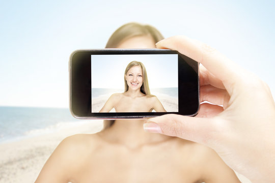concept image of a woman on a beach posing