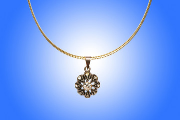 Fototapeta premium Golden jewellery against gradient background