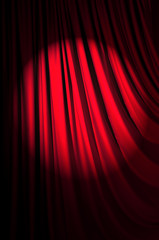 Brightly lit curtains in theatre concept