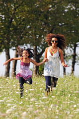 Fototapeta premium mother and daughter running
