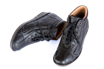 Pair of black women's short boot on white background