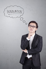 Businessman thinking about innovation