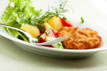 Wiener Schnitzel with Potatoes and Fresh Vegetables