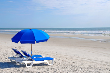 Beach Chairs with Blue Umbrella