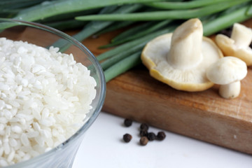 cup of rice, mushrooms and onion