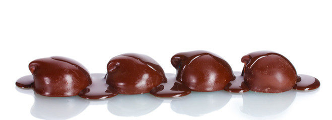 Сhocolate cookies poured chocolate  isolated on white