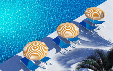 Swimming pool lounge hotel yellow striped umbrellas