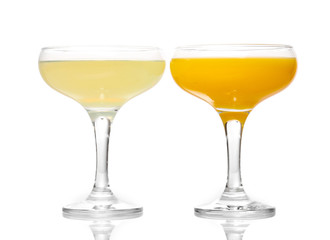 Tropical juices in glasses isolated on white