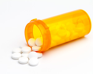 Pills tablets round out of container