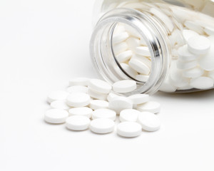 Tables pills round out of clear container