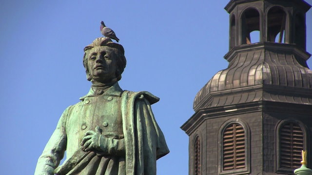 Poet Adam Mickiewicz and Town Hall Tower, Krakow, Poland