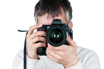 Young man with camera, isolated on white background