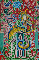 Colorful Chinese dragon on temple door