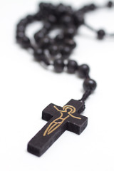 Fototapeta na wymiar Brown rosary with crucifix - isolated