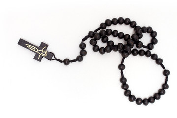 Brown rosary with crucifix - isolated