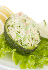 Crab meat salad with green caviar in avocado - japan cusine