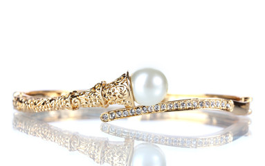 Beautiful golden bracelet with pearl on isolated on white