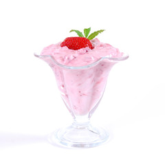 Fresh juicy strawberry with yogurt in a glass bowl