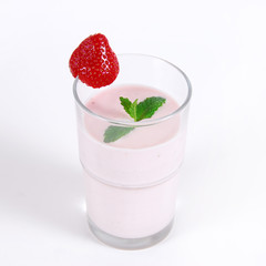 Strawberry shake in a glass decorated with a strawberry