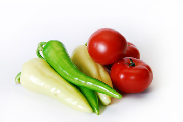 tomatoes and papricas isolated on white background