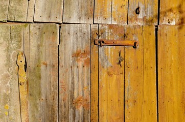 Fototapeta na wymiar Old farm building door.