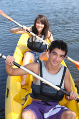 Teenagers canoeing