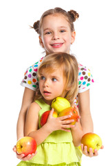 Fototapeta premium Portrait of two happy girls with apple
