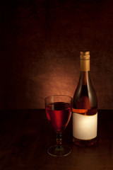 Wine bottle and glass