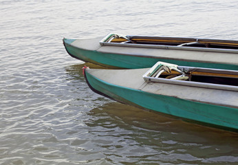 Canoes on still water