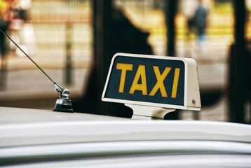 taxi sign on the road