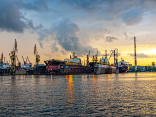 Fototapeta premium Shipyard of Gdansk at sunset, Poland.