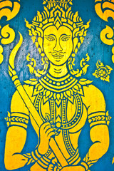 gold thai temple door with blue background