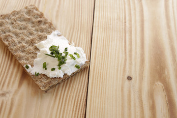 Whole grain bread with curd and chives