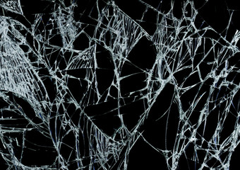 Broken glass texture over black background