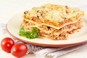 Italian cuisine. Meat lasagna  on the served table