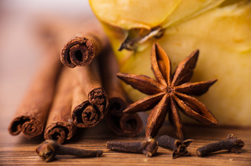Closeup of cinnamon sticks and chocolate