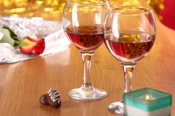 A celebratory dinner with a rose, candle