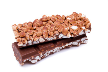 close up of chocolate with puffed rice bar on white background