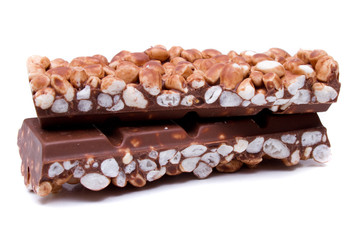 close up of chocolate with puffed rice bar on white background